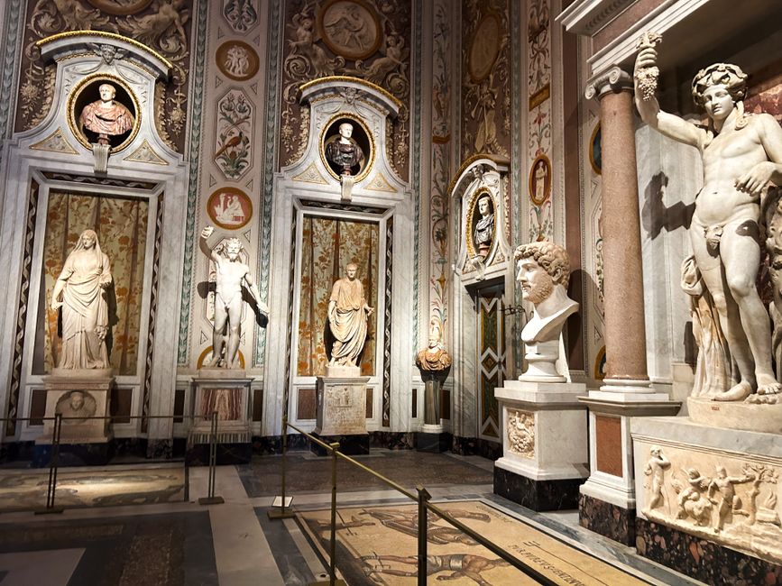 Exquisite ancient Roman sculptures and decor inside Borghese Gallery, Rome, showcasing historic art.