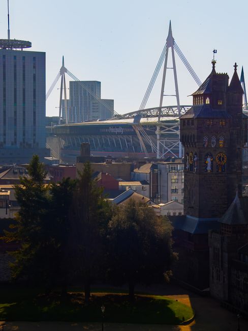 A scenic view of Cardiff highlighting the iconic Principality Stadium and historic architecture.