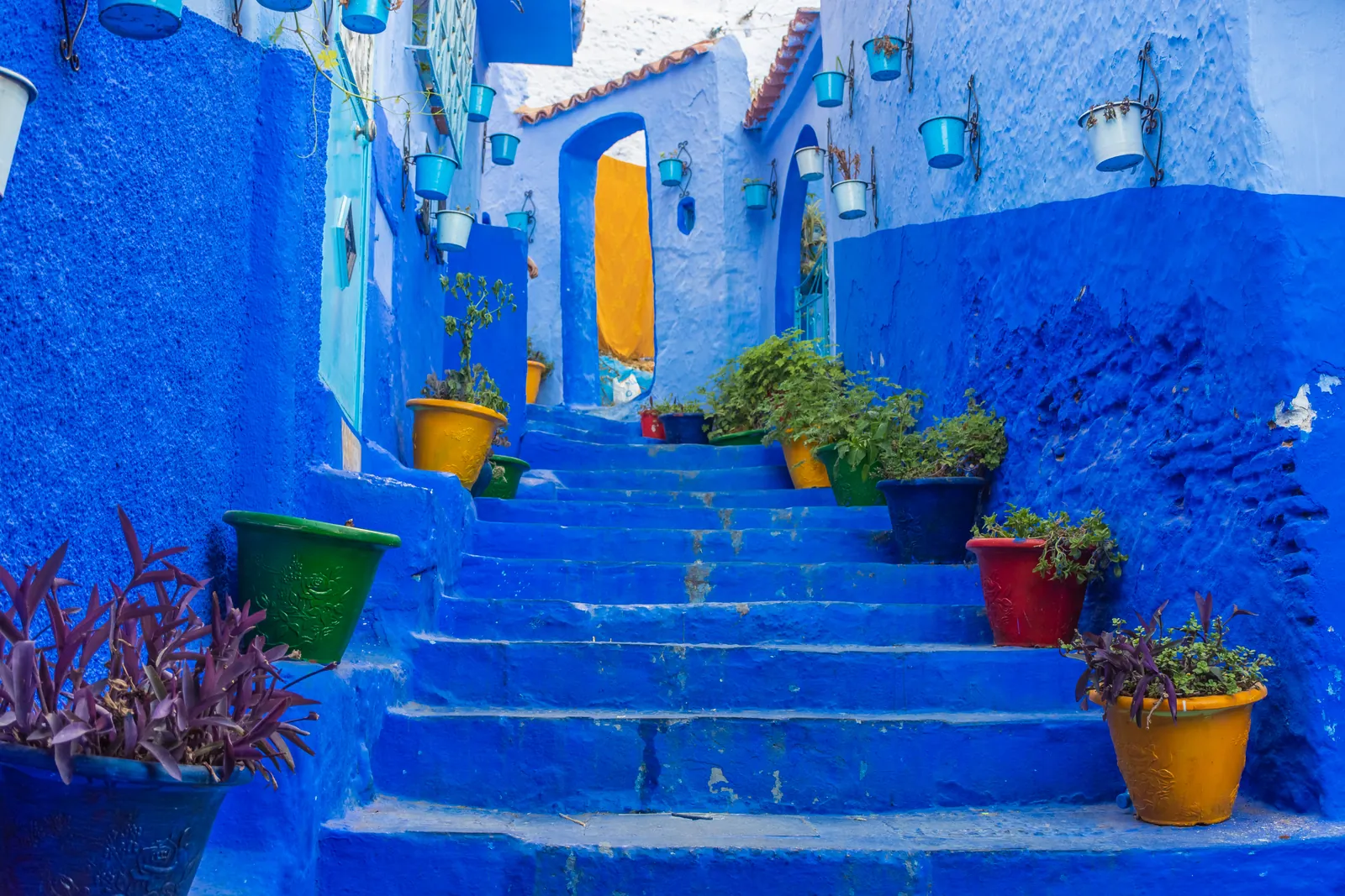 Blue-painted stairs and walls in the medina of Chefchaouen, Morocco