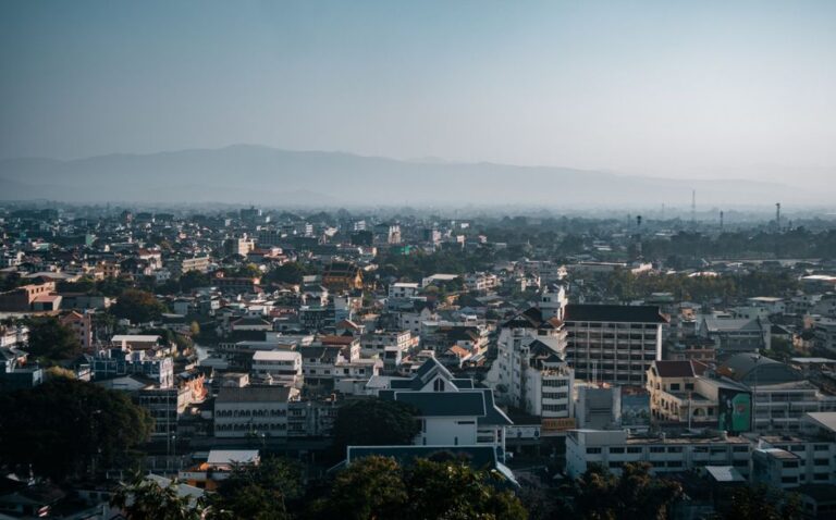 Aerial view of Mueang Chiang Rai city, showcasing its urban landscape and architecture.