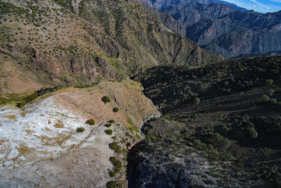 Stunning aerial landscape of Copper Canyon in Mexico showcasing rugged mountains and deep valleys.