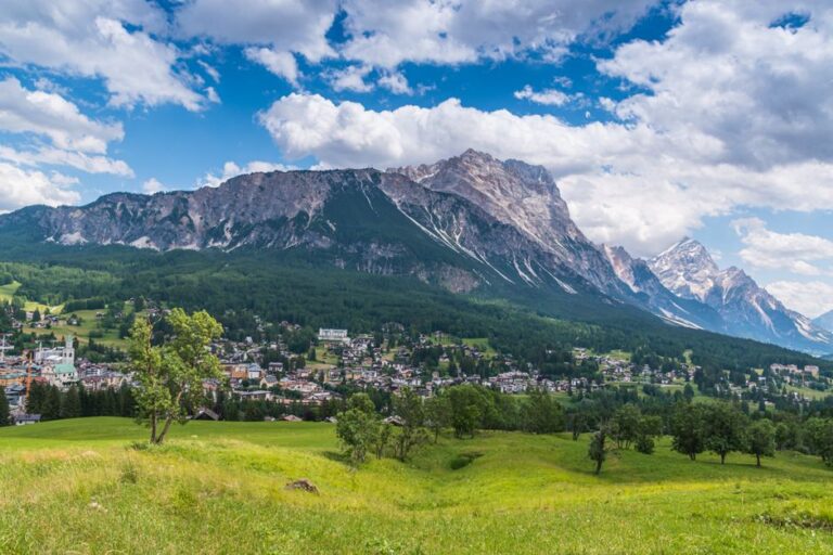 Breathtaking landscape of Cortina d'Ampezzo with the serene Dolomites in the background.