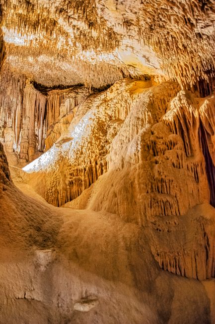 Explore the unique stalactite formations in Porto Cristo's stunning cave.