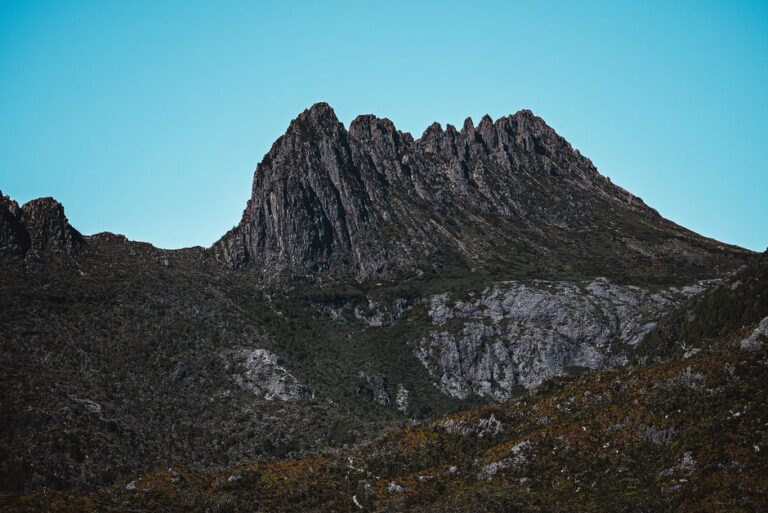 Explore the striking peaks of Cradle Mountain in Tasmania's wilderness.