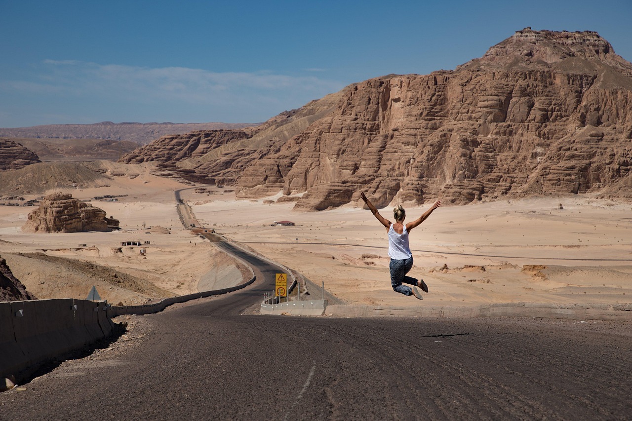 Woman, jump, desert, jumping woman, road, street, badlands, barren, barren landscape, freedom, happy, joy, summer, egypt, nature, dahab, sky, landscape, mountains, rocky mountains