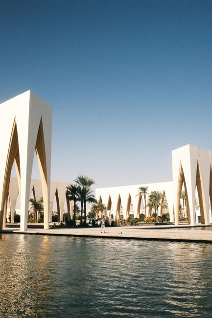 Striking modern architecture with arches in El Gouna, Egypt, under a clear blue sky.
