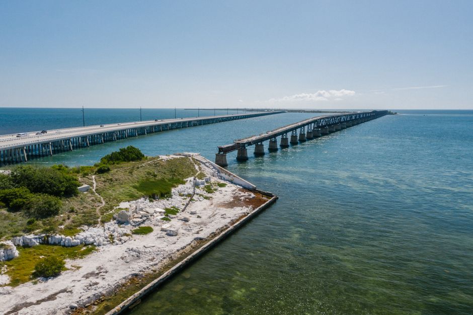 Stunning aerial shot of the Seven Mile Bridge stretching across clear blue waters in Florida.
