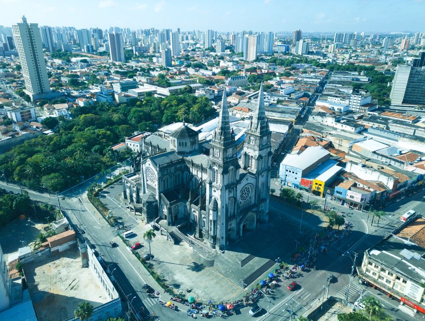 Stunning aerial view of the Metropolitan Cathedral amidst Fortaleza cityscape, Brazil.