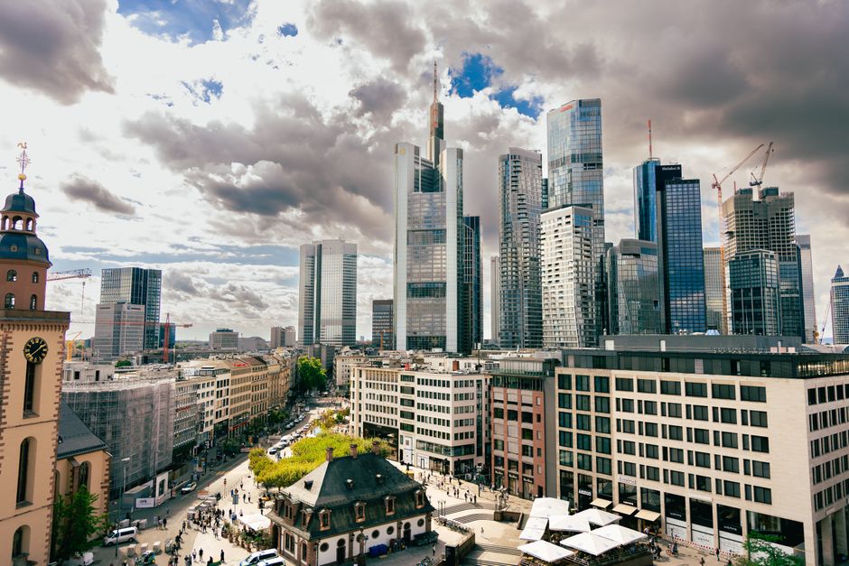 A stunning aerial view of Frankfurt's skyscrapers under dramatic skies. Perfect for business and travel enthusiasts.