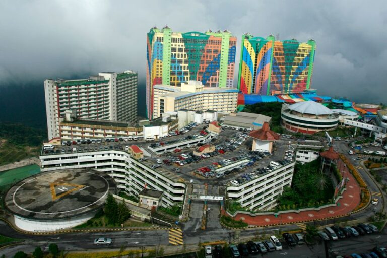 Aerial view of the colorful First World Hotel, a landmark in Malaysia's Genting Highlands.