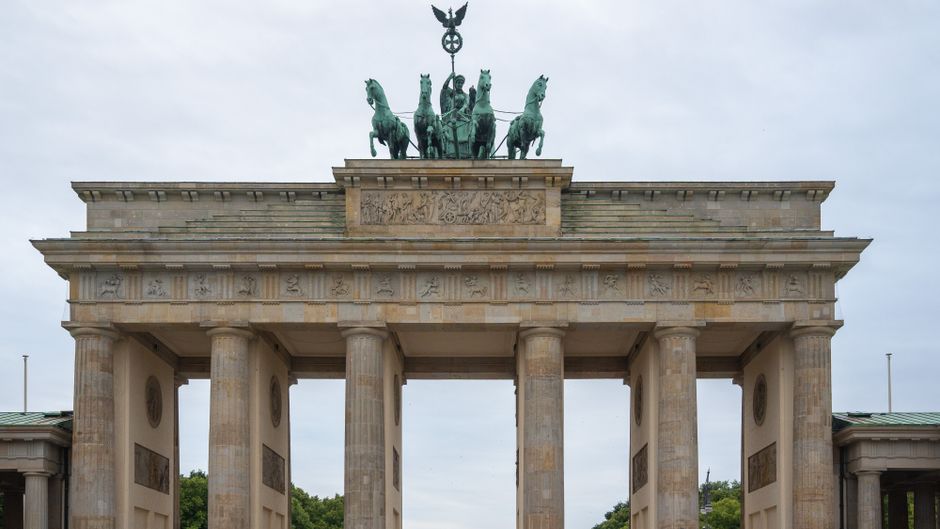 Iconic Brandenburg Gate in Berlin, an emblematic historic monument captured in daylight.