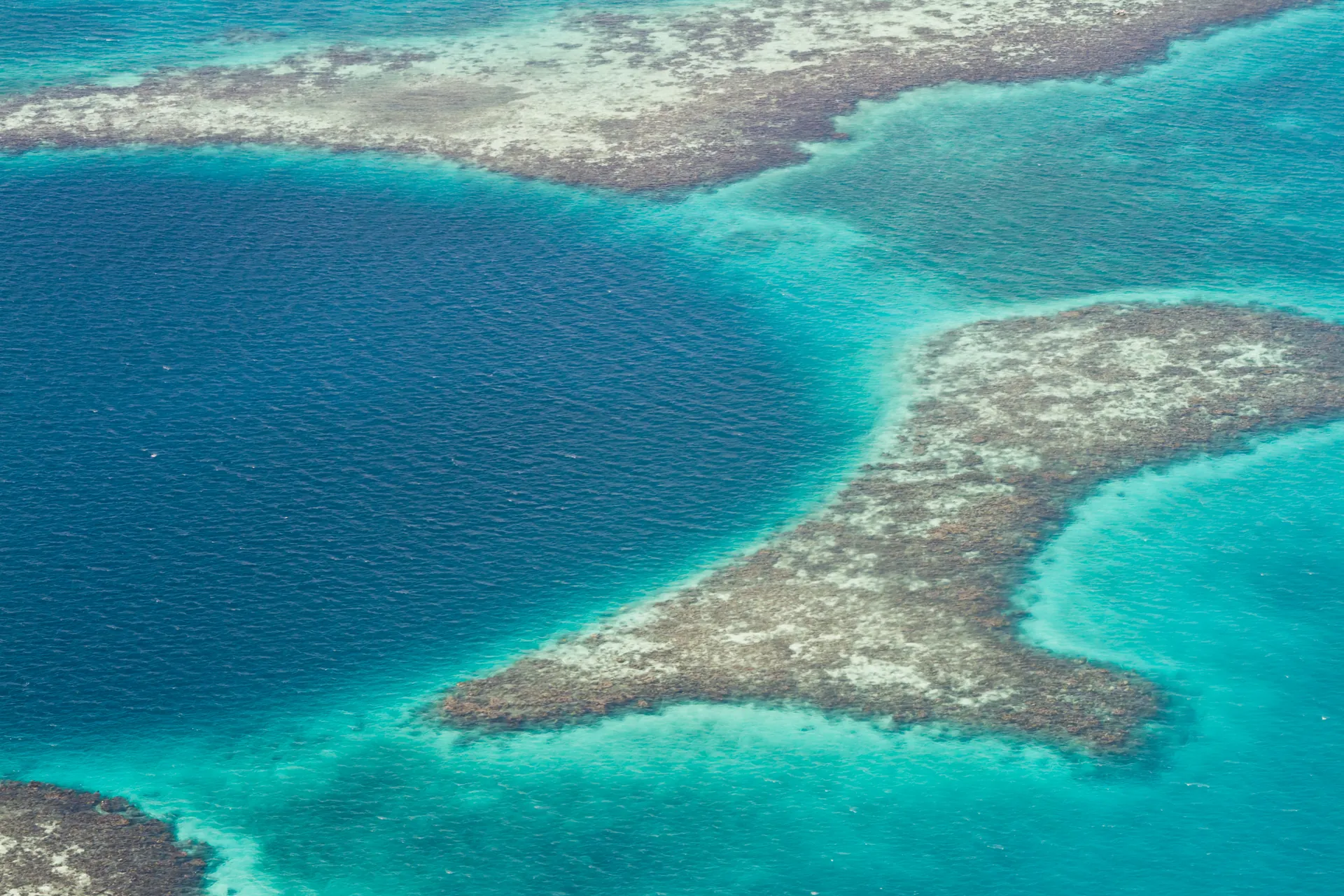 Aerial view of the Great Blue Hole off the coast of Belize