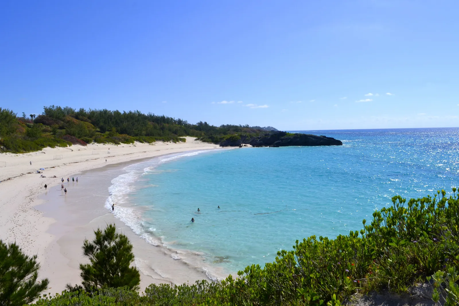 High angle view of people on a beach with pink sand on the island of Bermuda, Horseshoe Bay Beach