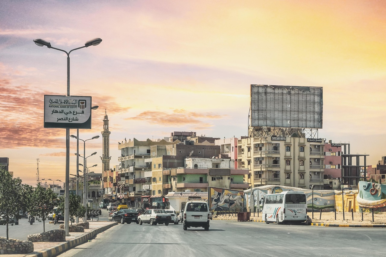 Street, traffic, buildings, city, lamp posts, street lamps, skyline, nature, sunset, dusk, twilight, street photography, egypt, hurghada