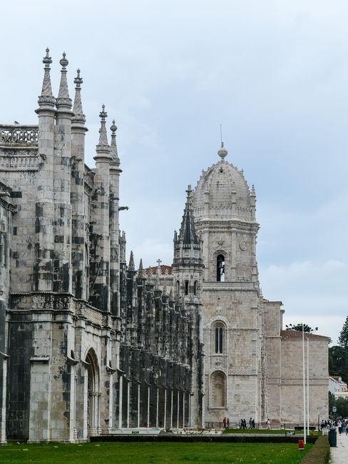 Explore the intricate Gothic architecture of the iconic Jerónimos Monastery in Lisbon, Portugal.