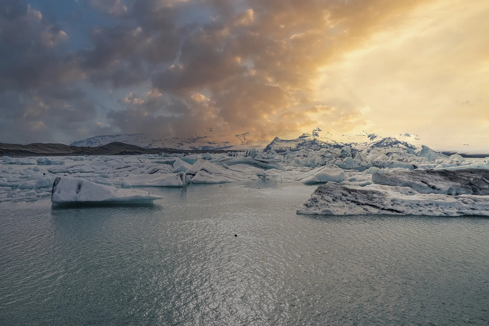 Icebergs in the Jökulsárlón glacier lagoon at sunset