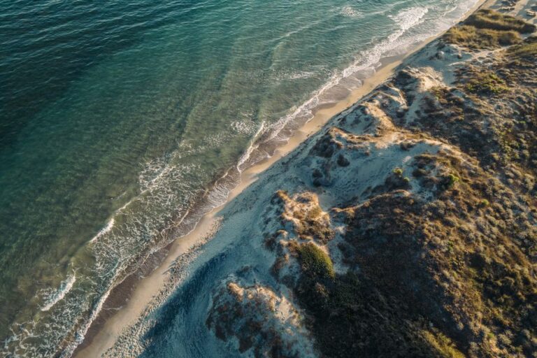 Drone capture of Kos, Greece with turquoise waters and sandy coastline.