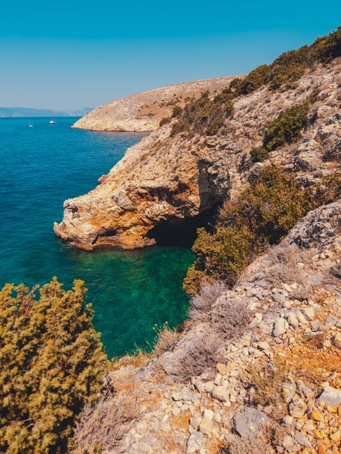 Stunning coastal cliffs and turquoise waters in Krk, Croatia, showcasing natural beauty.