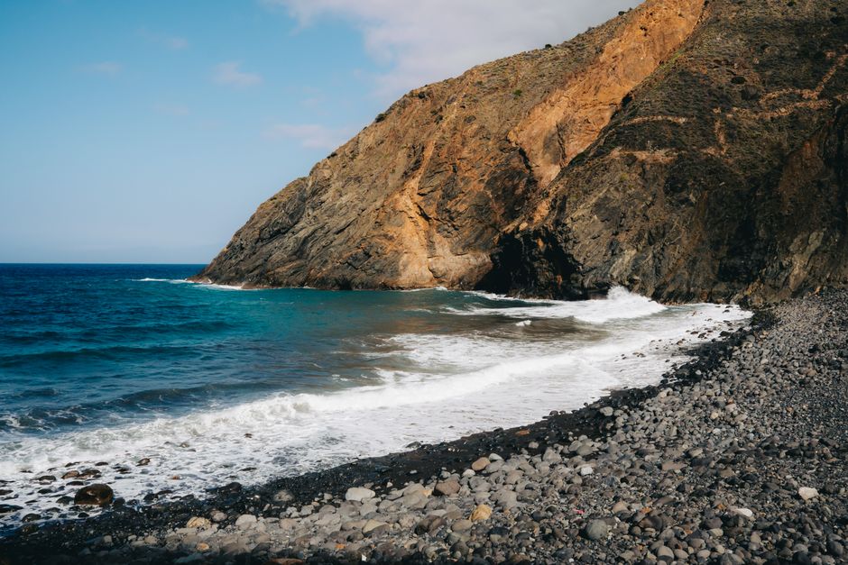 Explore the rugged beauty of Vallehermoso's volcanic cliffs and wild coastline in La Gomera, Canary Islands.