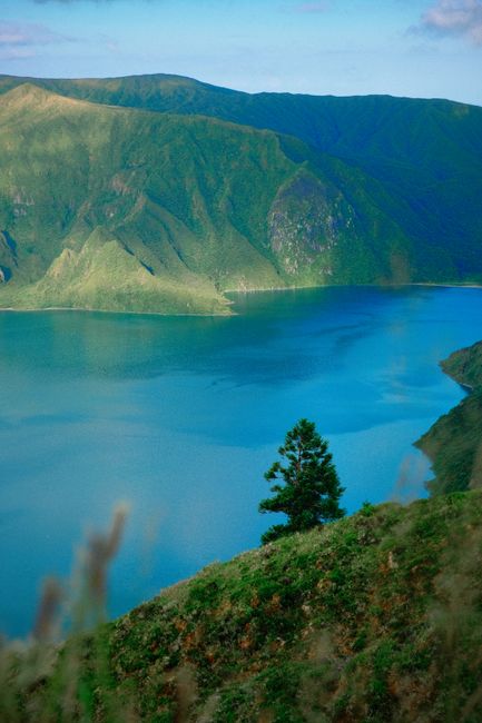 Breathtaking view of Lagoa do Fogo in Azores, Portugal, surrounded by lush green mountains.