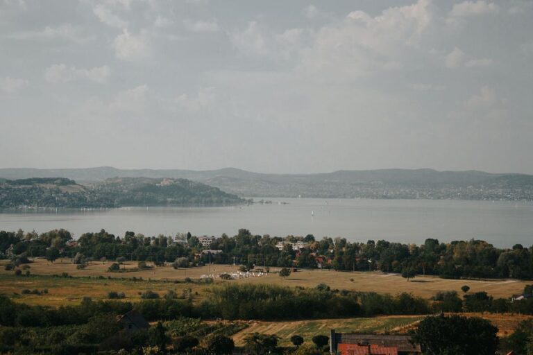 Picturesque landscape of Lake Balaton with surrounding hills in Hungary.