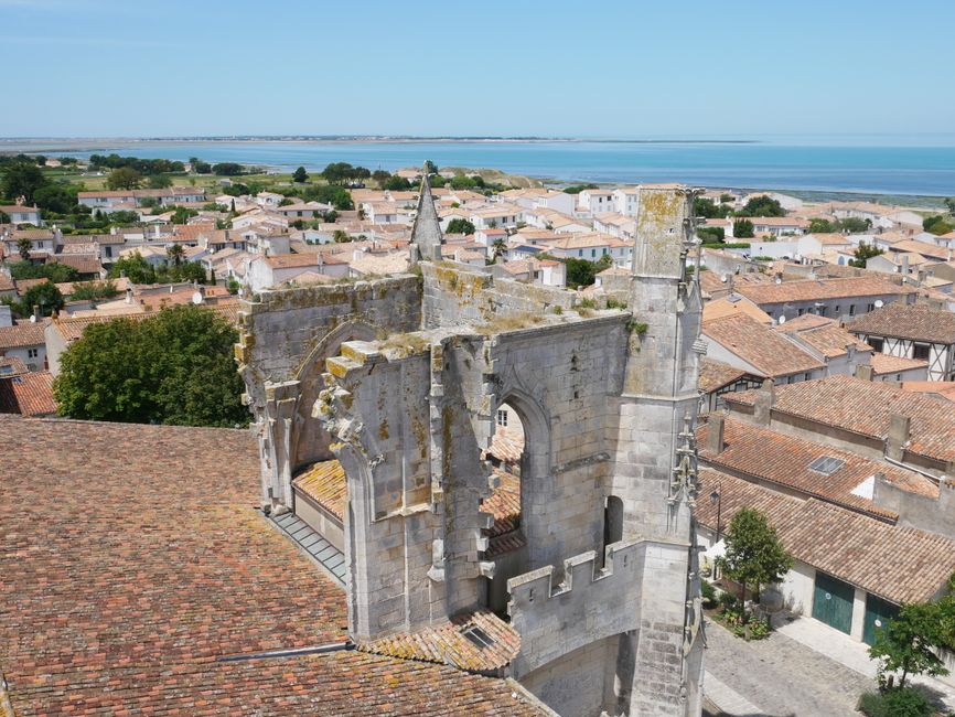 Scenic aerial view of historic ruins and rooftops in Saint-Martin-de-Ré, France.