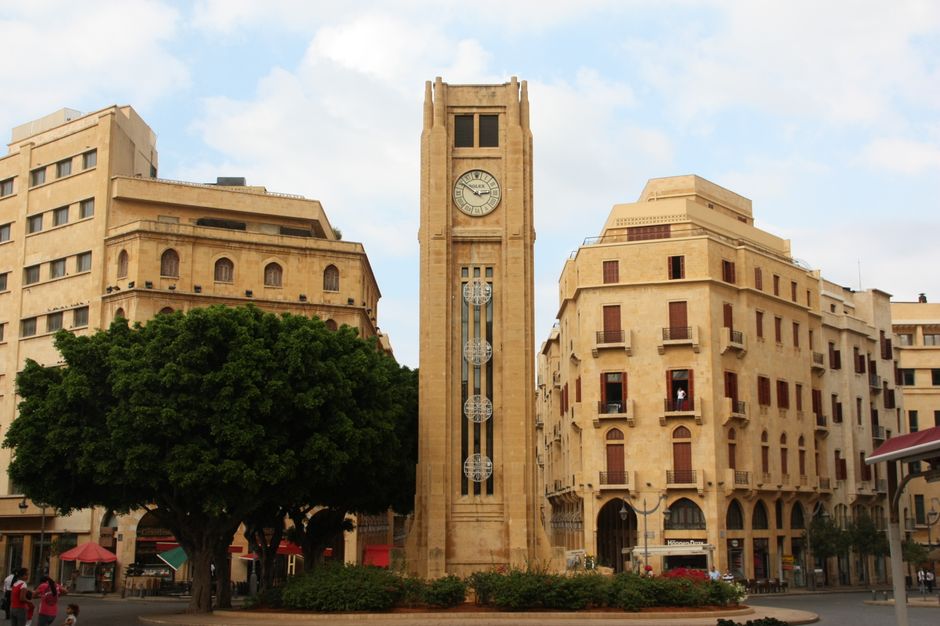 The historic clock tower situated in downtown Beirut, Lebanon amidst classic architecture.