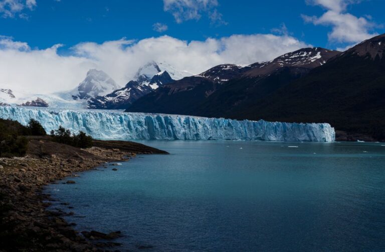 Stunning landscape of Perito Moreno Glacier in Patagonia, showcasing icy beauty and rugged mountains.