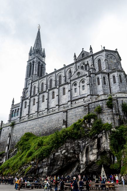 Dramatic view of the Basilica of Our Lady of Lourdes in Occitanie, France.