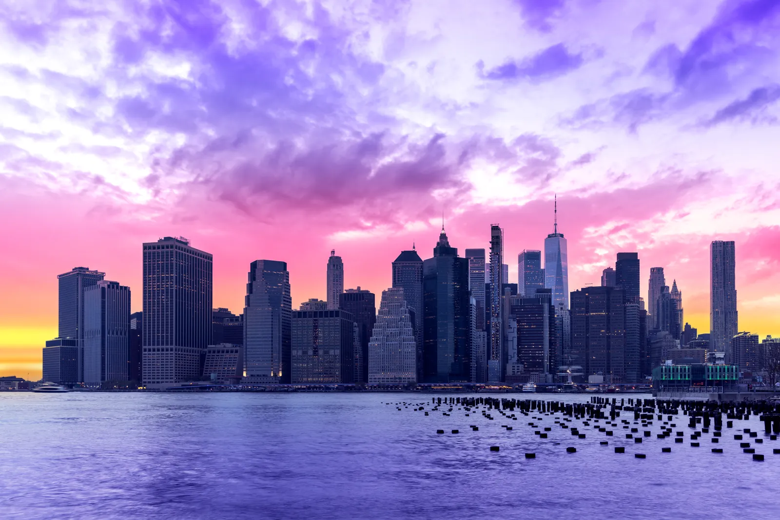 The Manhattan skyline across the river at sunset, New York