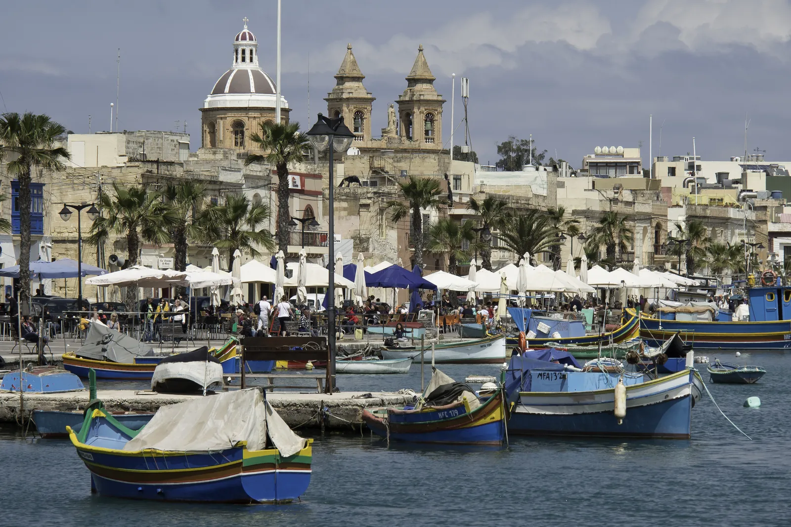 Colourful fishing boats in Marsaxlokk harbour