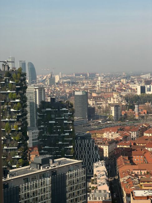 Skyline of Milan showcasing modern skyscrapers and historical architecture.