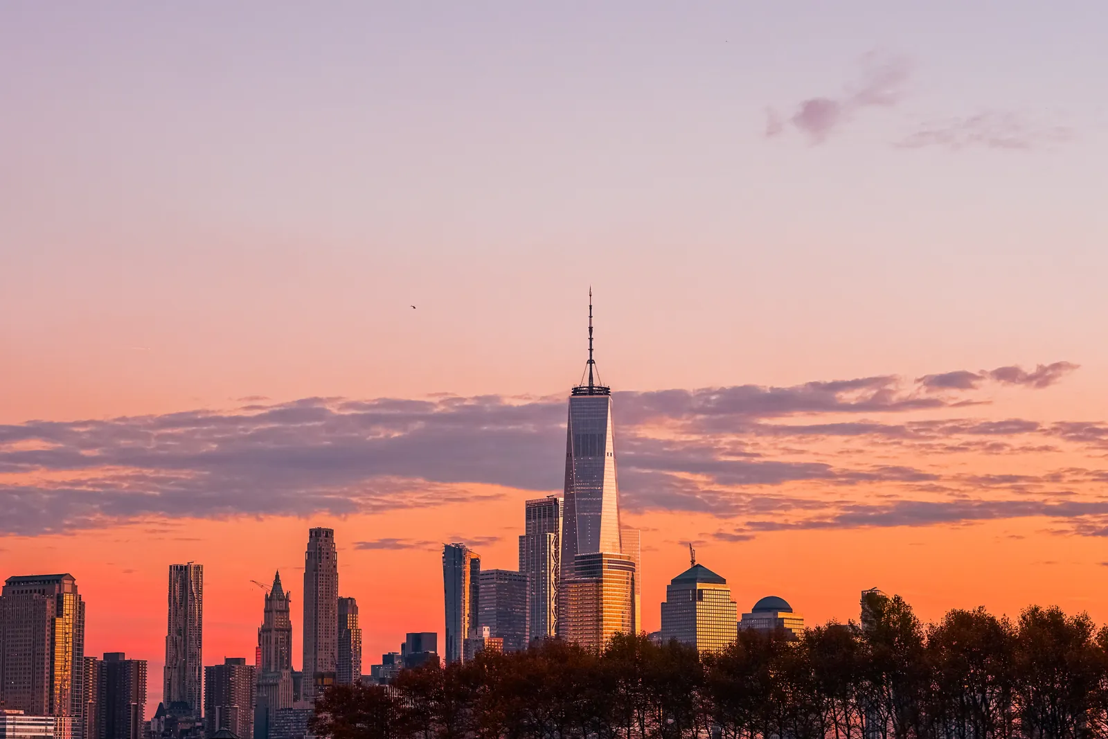 The New York City skyline glowing at sunset