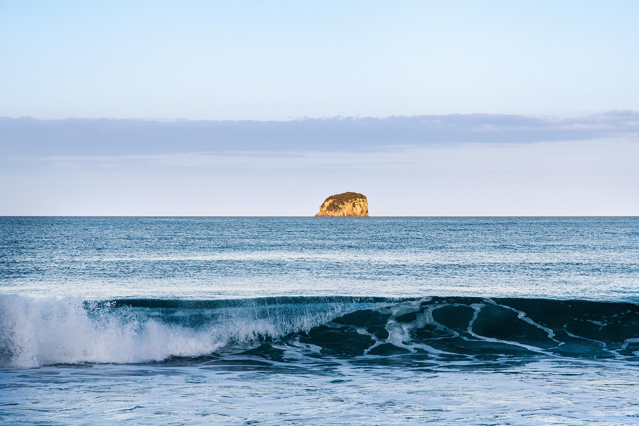 Island, waves, sunset, ocean, shore, sky, beach, scenic, sea, nature, rock in the surf, pauanui, northern island, new zealand