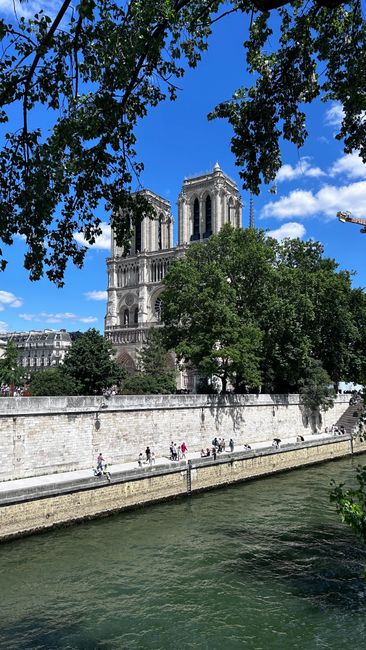 Capture of the iconic Notre-Dame Cathedral by the Seine River, Paris.