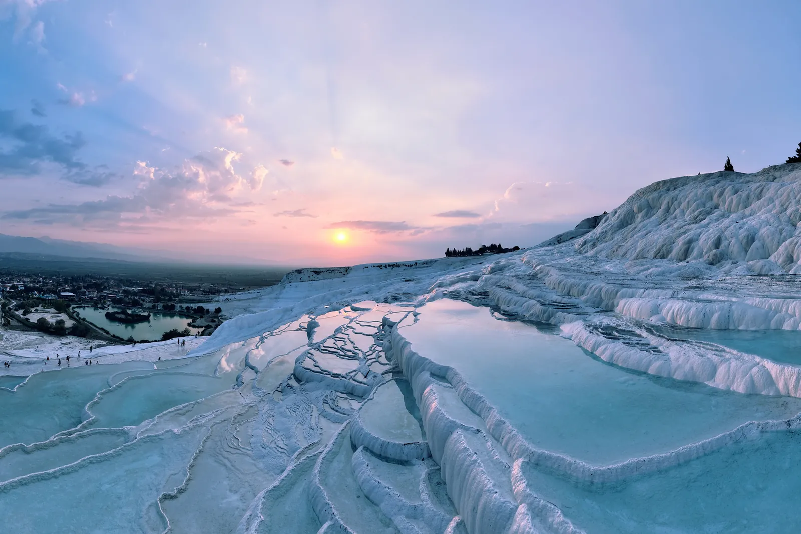 White travertine terraces of Pamukkale at sunset