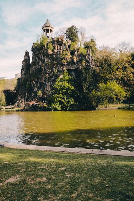 Beautiful summer view of Temple de la Sibylle in Parc des Buttes-Chaumont, Paris.