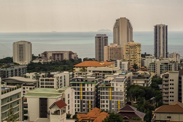 High-rise buildings overlooking the ocean in Pattaya, Thailand, offering a panoramic view.