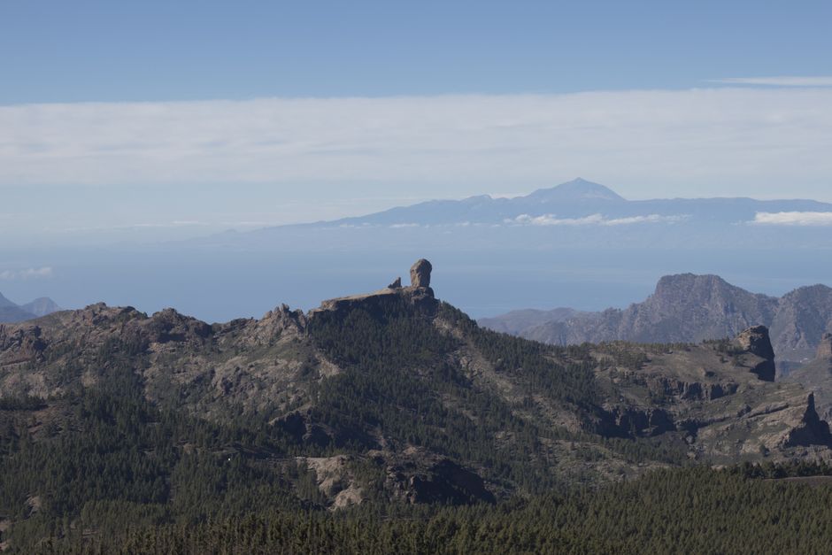 Breathtaking landscape of Roque Nublo with Mount Teide in the distance, Gran Canaria, Spain.
