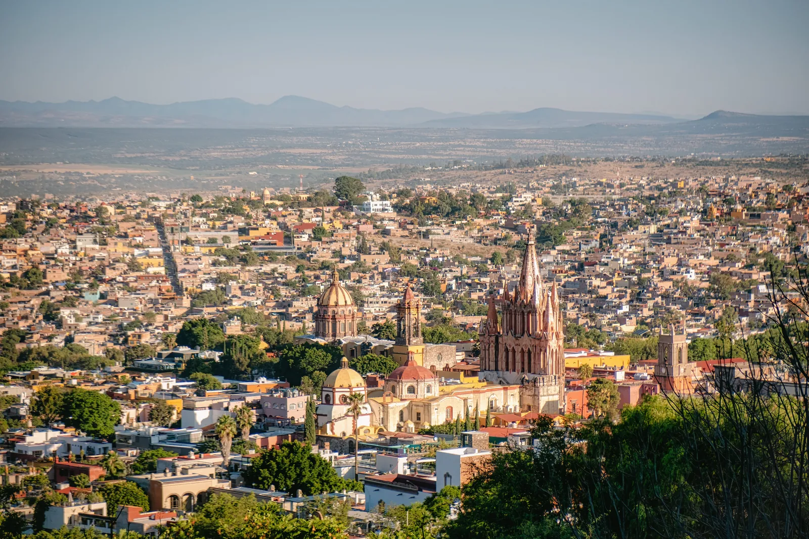 The rooftops and pink Parroquia of San Miguel de Allende, Mexico