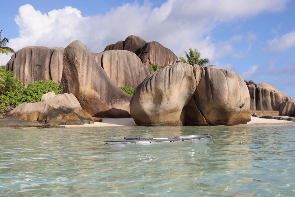Discover the stunning beach with distinctive granite rocks and clear turquoise water in Seychelles.