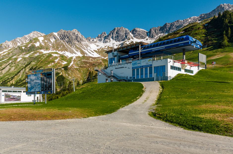 Ski lift station at Sankt Anton am Arlberg, Austria with snowy mountain landscape, perfect for winter sports enthusiasts.