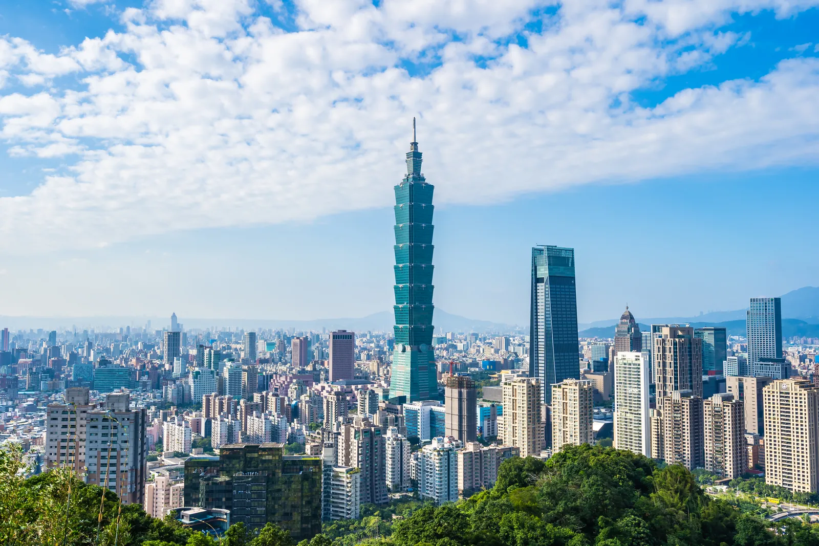 The Taipei cityscape with Taipei 101 under a blue sky, Taiwan