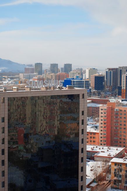 High-angle view of Ulaanbaatar's modern skyline featuring the Samsung building.