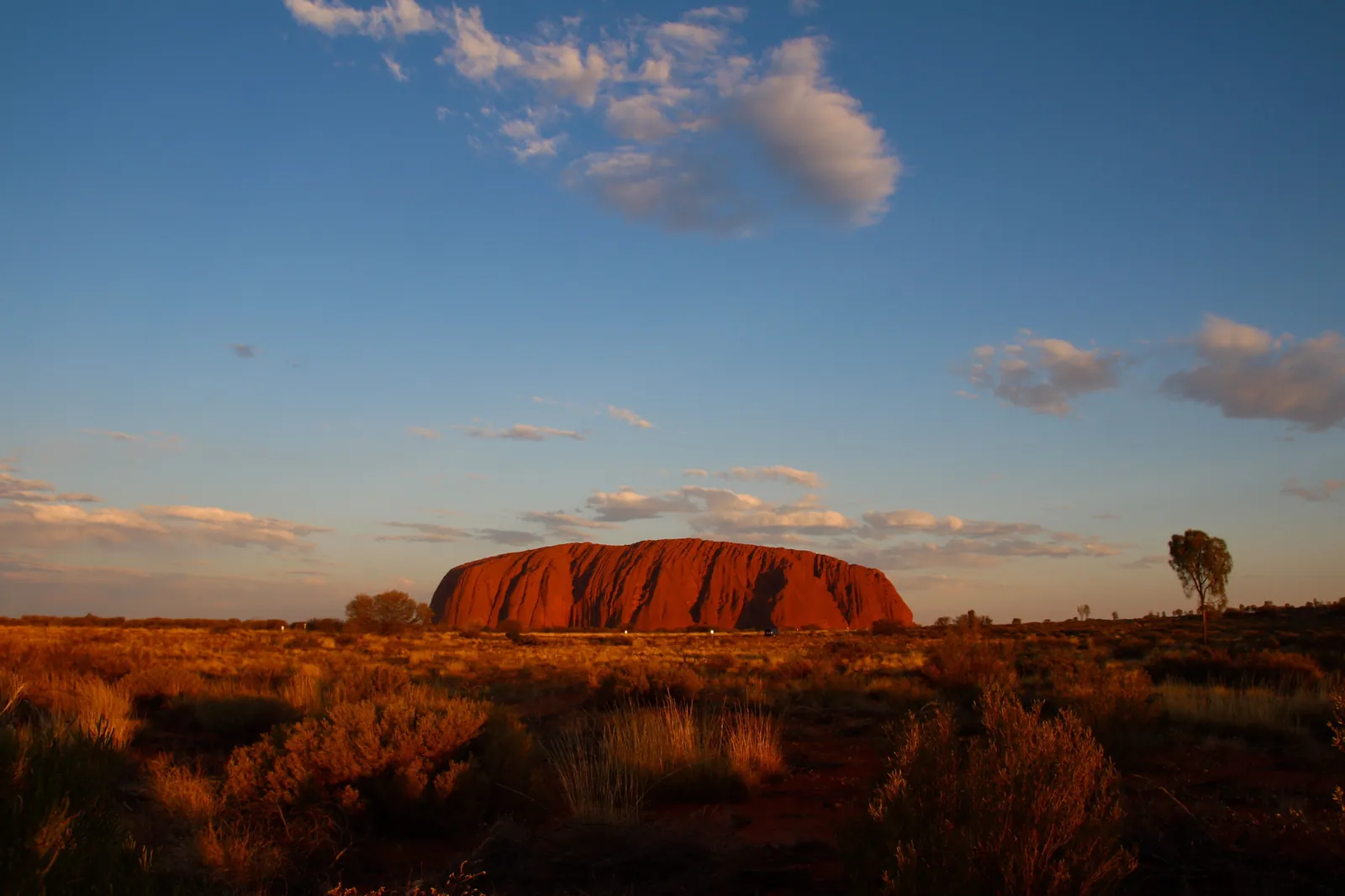 The red sandstone monolith of Uluru in the Northern Territory, Australia