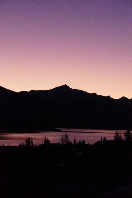 Scenic silhouette of mountains and lake at twilight in Wanaka, Otago, New Zealand.