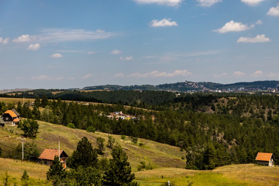 Peaceful landscape of wooded hills and distant horizon in Zlatibor, Serbia.
